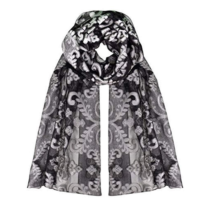 Lightweight summer burnout scarf featuring delicate white floral embroidery on a black and white fabric base