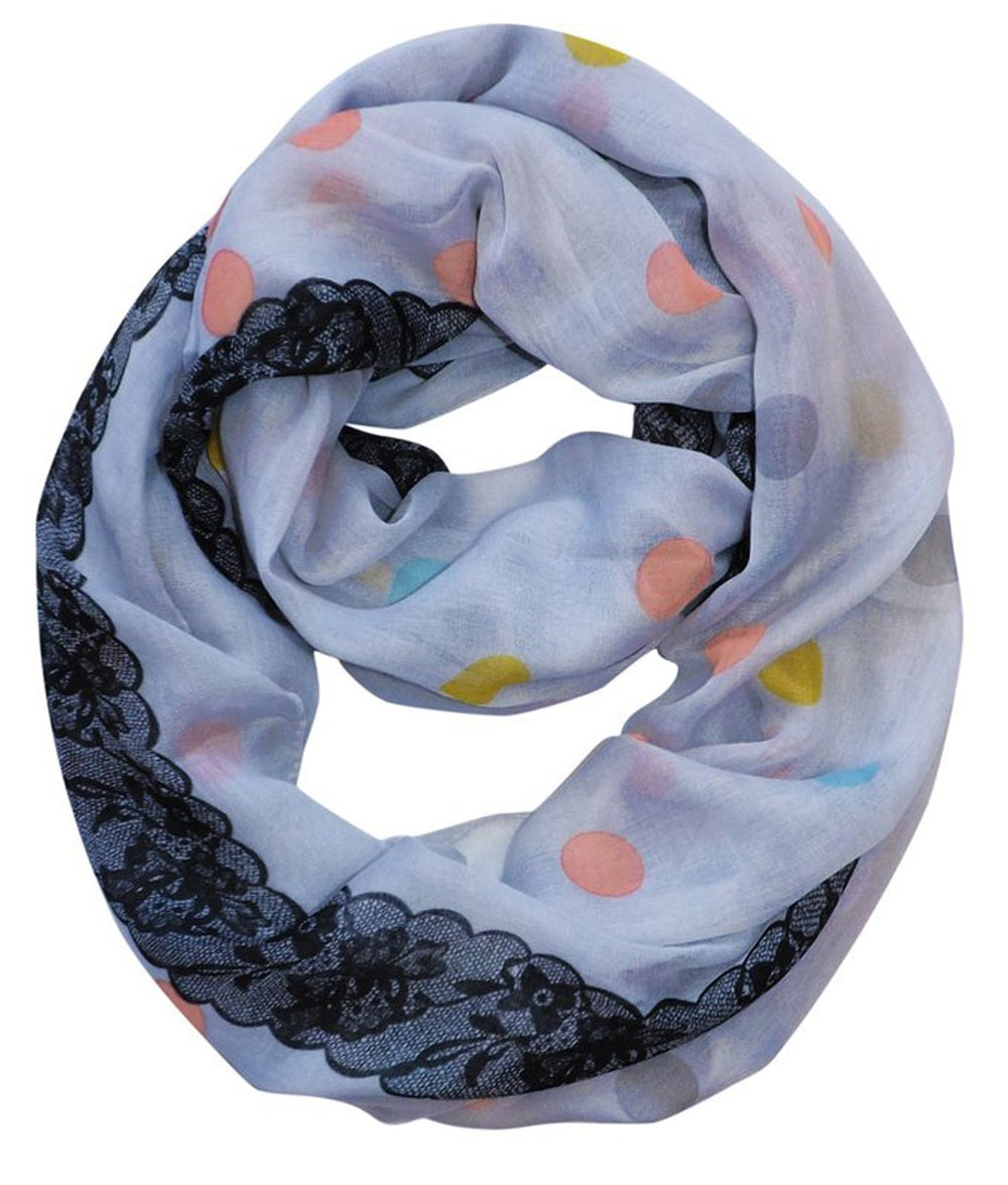 Elegant periwinkle infinity loop scarf featuring a white polka dot and floral graphic print.