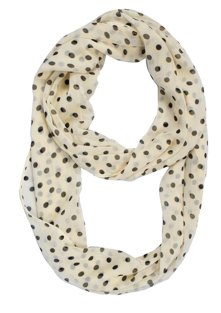 Lightweight cream infinity loop scarf featuring a small polka dot pattern in a sheer fabric for women.
