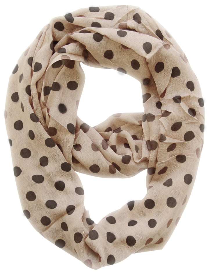 Lightweight and sheer cream infinity loop scarf with a vintage-inspired polka dot and circle print.