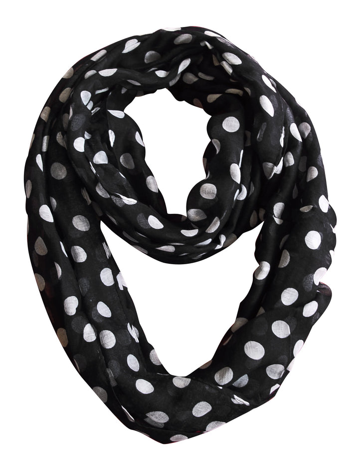 Lightweight and sheer black and white polka dot infinity loop scarf with a classic circle print.