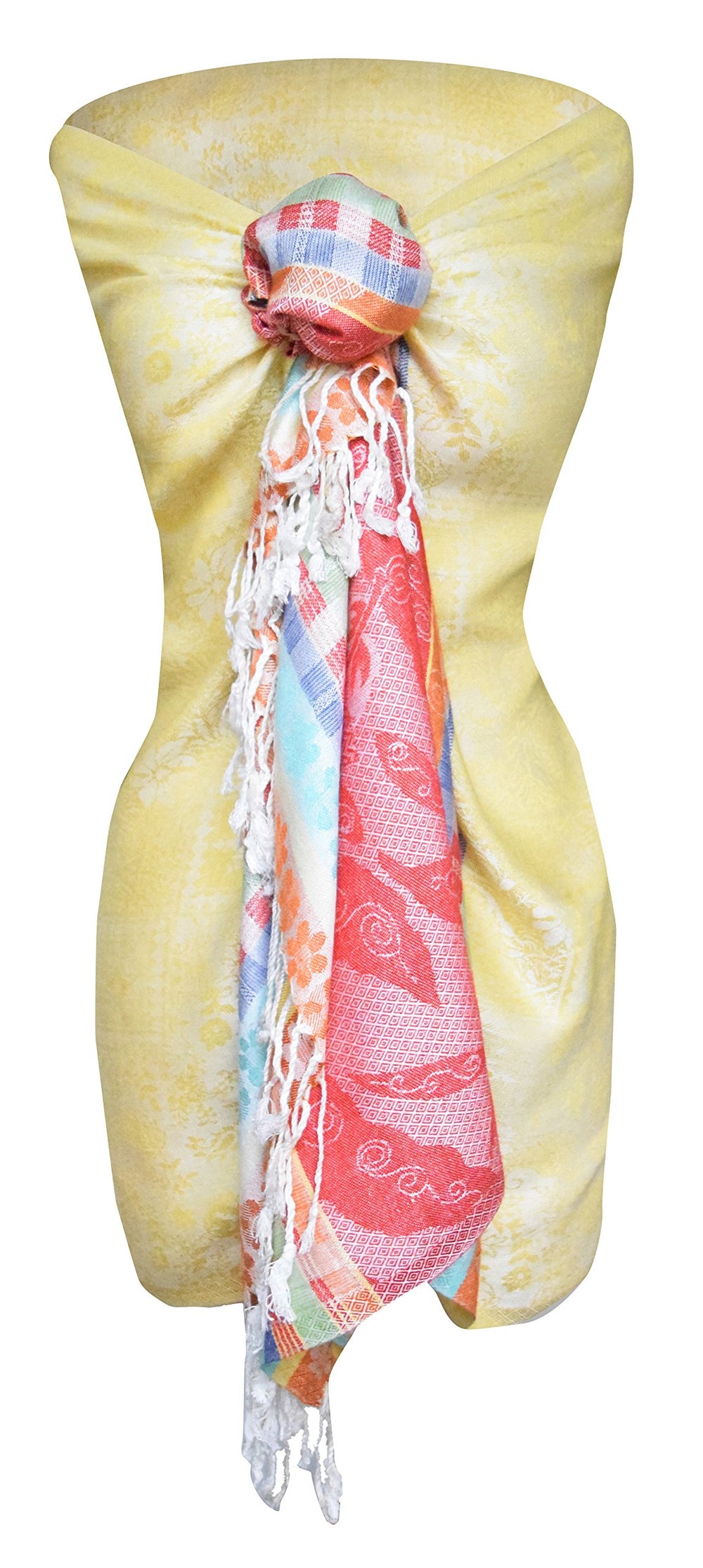 Vibrant yellow pashmina shawl featuring a multicolored rainbow pastel paisley floral pattern and fringed edges.