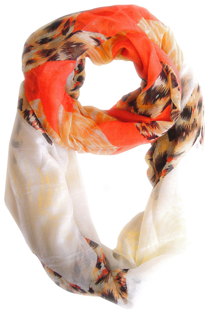 Salmon and orange infinity loop scarf featuring a mixed animal print and wide chevron design