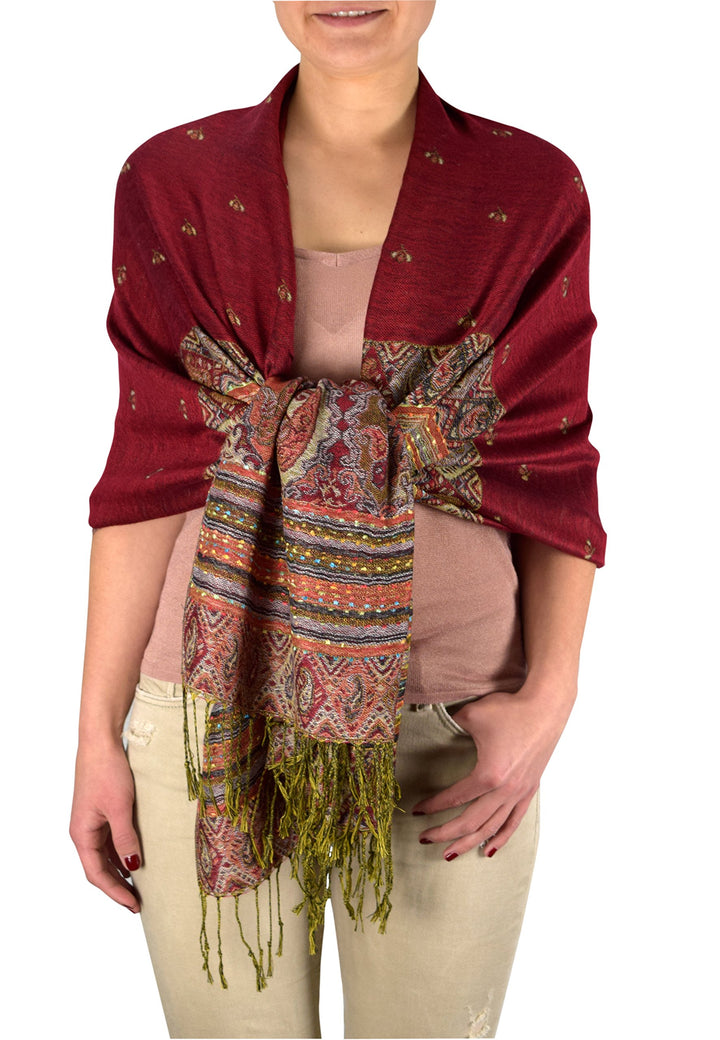 Maroon reversible bohemian pashmina shawl with an ethnic tribal border design and fringe edges.