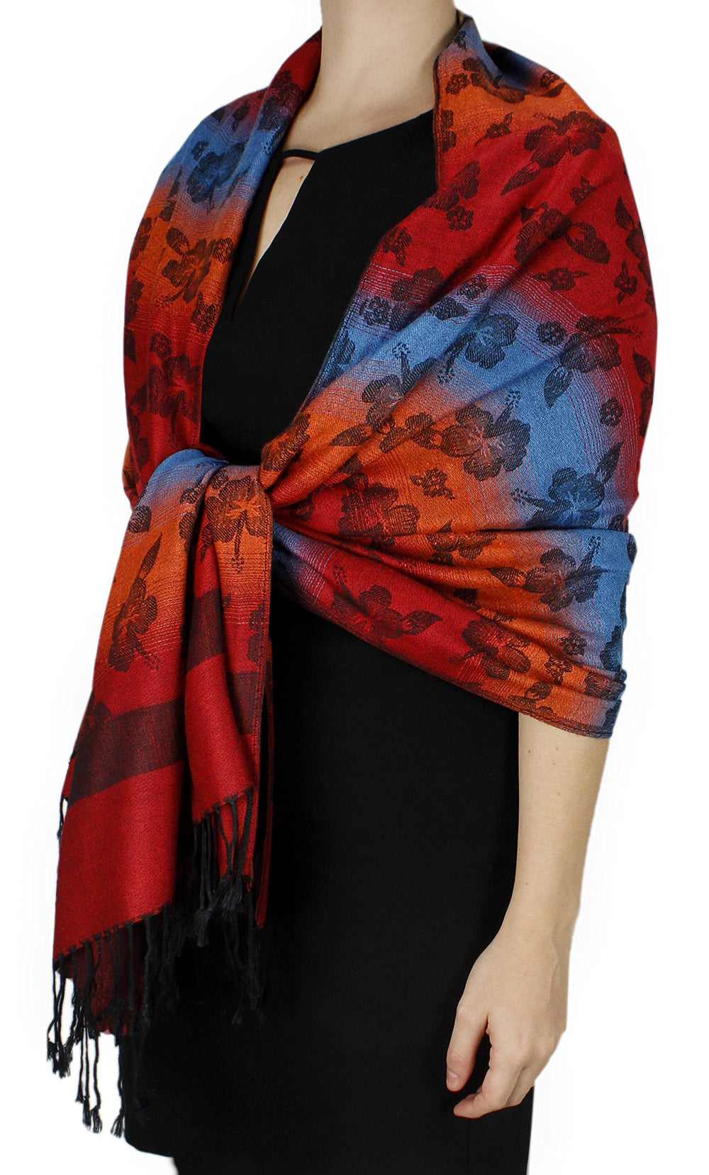 Rainbow silky tropical pashmina shawl with a vibrant floral pattern and fringed edges.