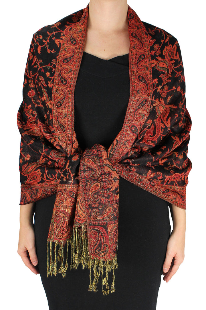 Elegant double layer reversible paisley pashmina shawl wrap scarf in red and black with fringed edges.