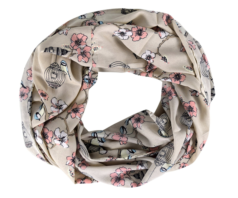 Sheer peach infinity scarf featuring a delicate bird print pattern for women