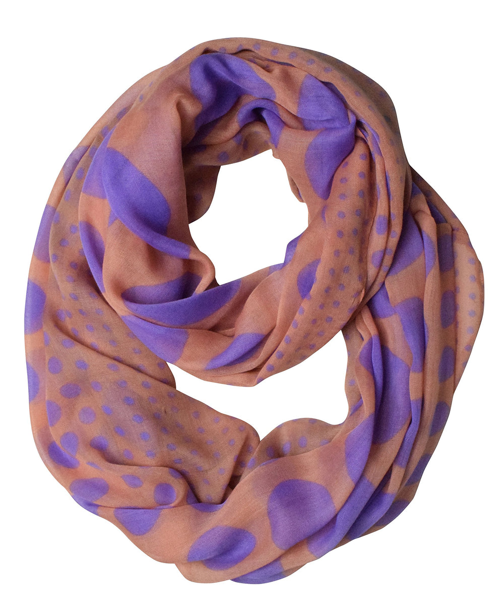 Vibrant multicolored polka dot infinity loop scarf in pink and purple.