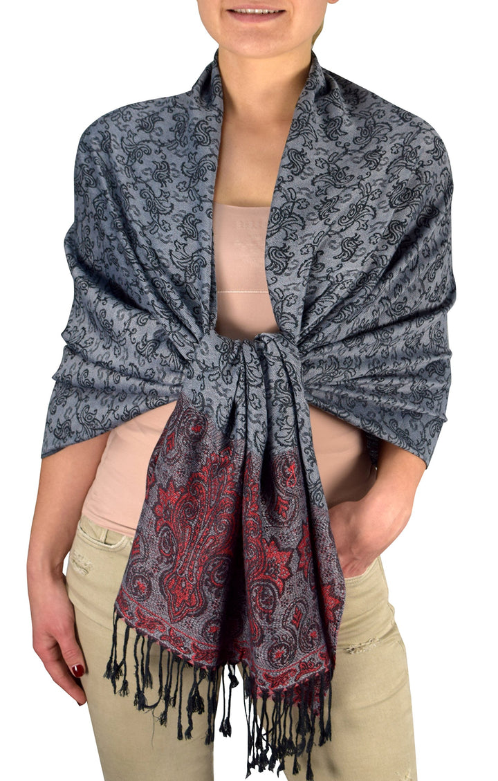 Elegant grey and red reversible pashmina shawl featuring an intricate jacquard vine and paisley pattern with delicate fringed edges.