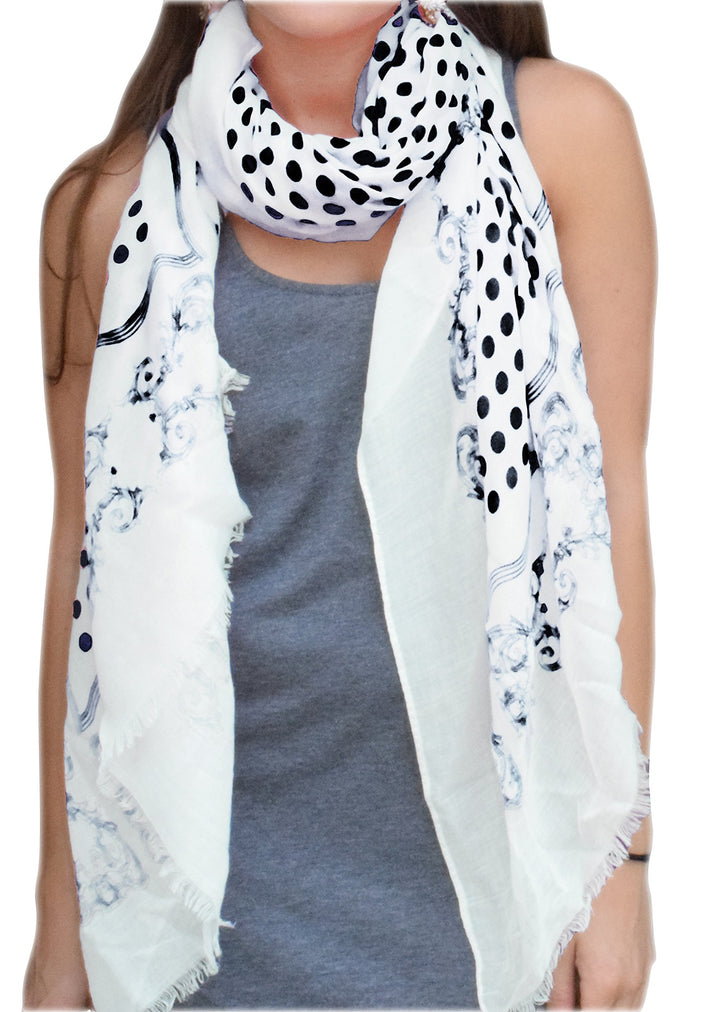 Elegant black and white polka dot paisley border scarf with soft eyelash fringe.