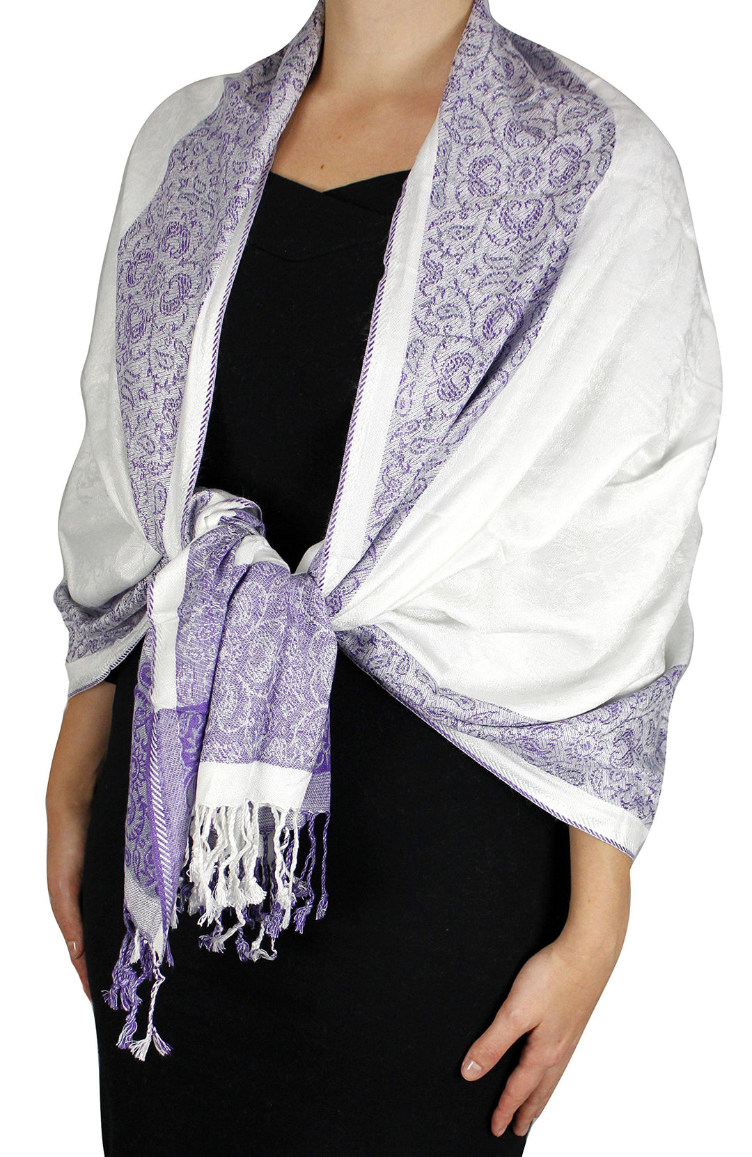 Reversible pashmina shawl featuring a white and purple paisley pattern with a floral border and fringe trim.