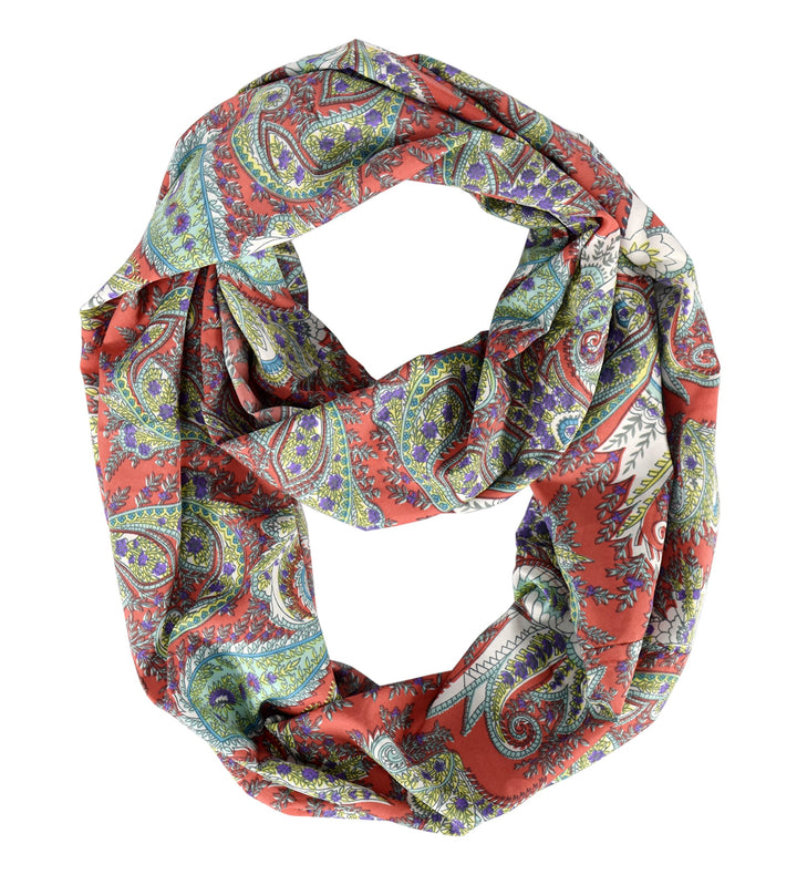 Lightweight red and coral bohemian infinity loop scarf featuring a paisley and floral graphic print.