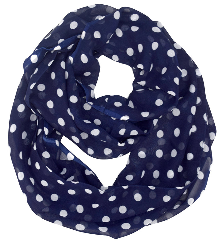 Lightweight and sheer navy blue infinity loop scarf featuring a white polka dot and circle print for women.