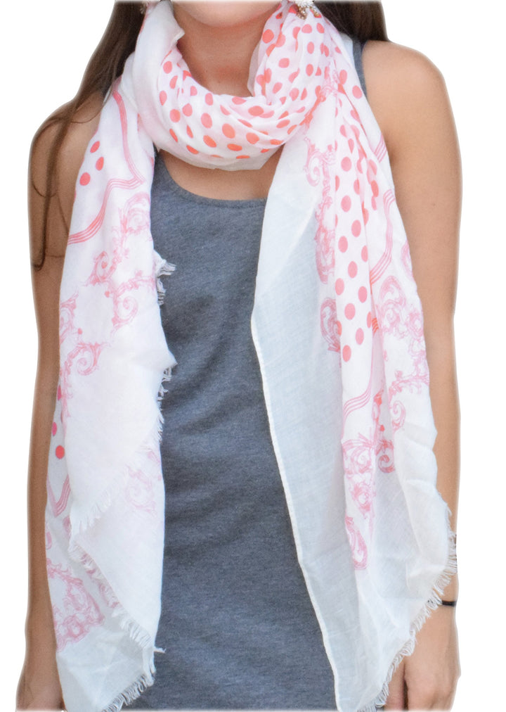 Elegant coral pashmina scarf with a chic paisley border and polka dot center featuring soft eyelash fringe.