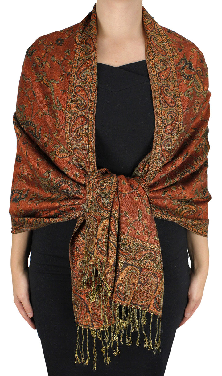 Double layer reversible pashmina shawl wrap with a rust-colored paisley pattern and fringed edges.