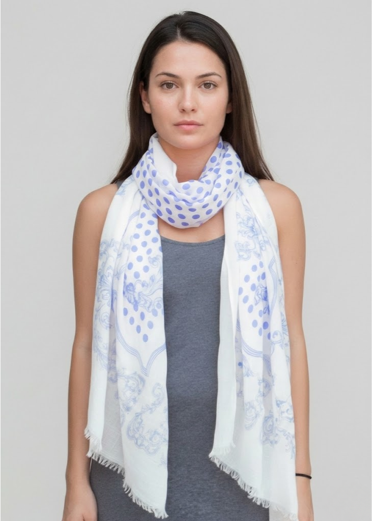 Stylish blue polka dot paisley fringe scarf for women with intricate patterns and textured tassel edges.
