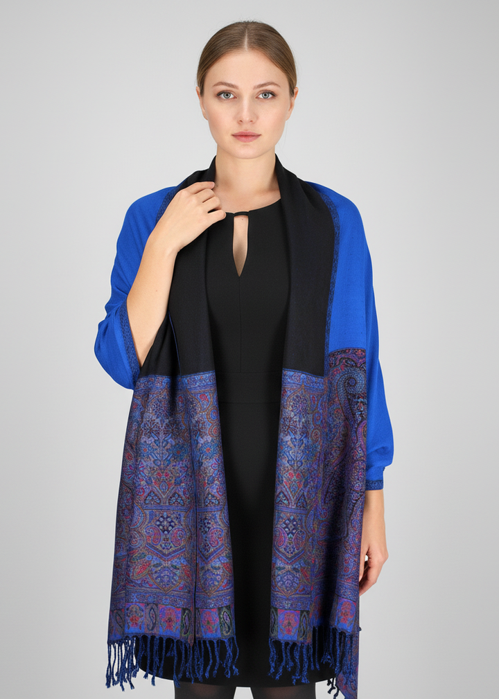 Reversible double-layered pashmina shawl featuring a vibrant boho paisley floral pattern and delicate fringe trim.