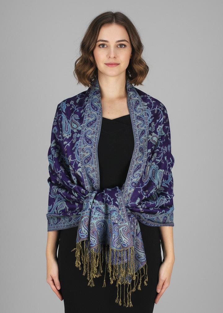 Double layered reversible pashmina shawl featuring an intricate jacquard paisley pattern and delicate fringe edges.