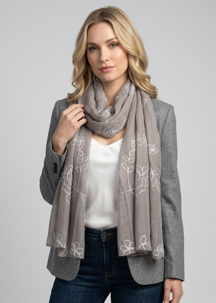 Floral embroidered summer shawl scarf with delicate stitching and lightweight fabric suitable for warm weather fashion accessory