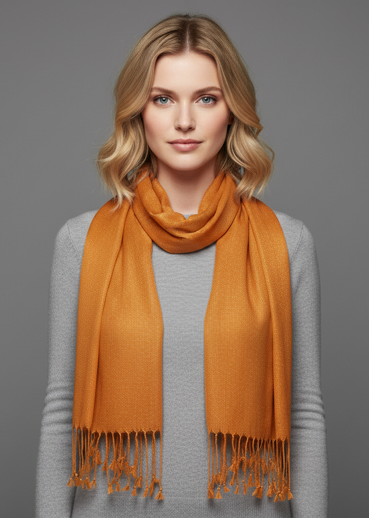 Sheer lightweight summer scarf featuring a floral burnout pattern with intricate embroidery and delicate fringe edges