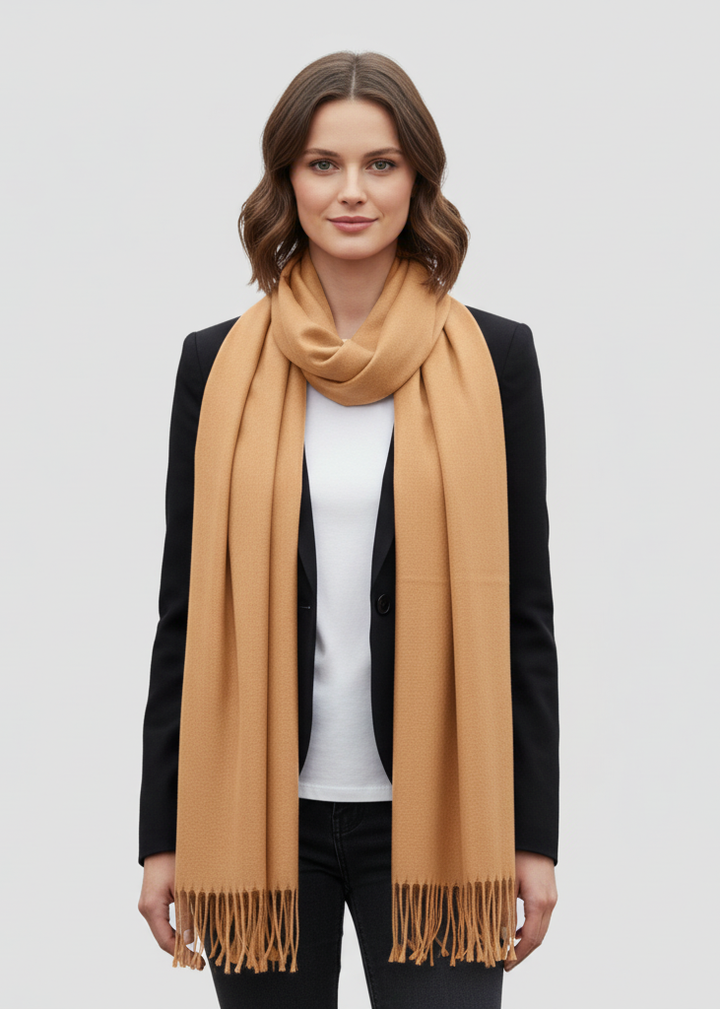 Luxury tan cashmere and silk pashmina shawl in a lightweight wrap design.