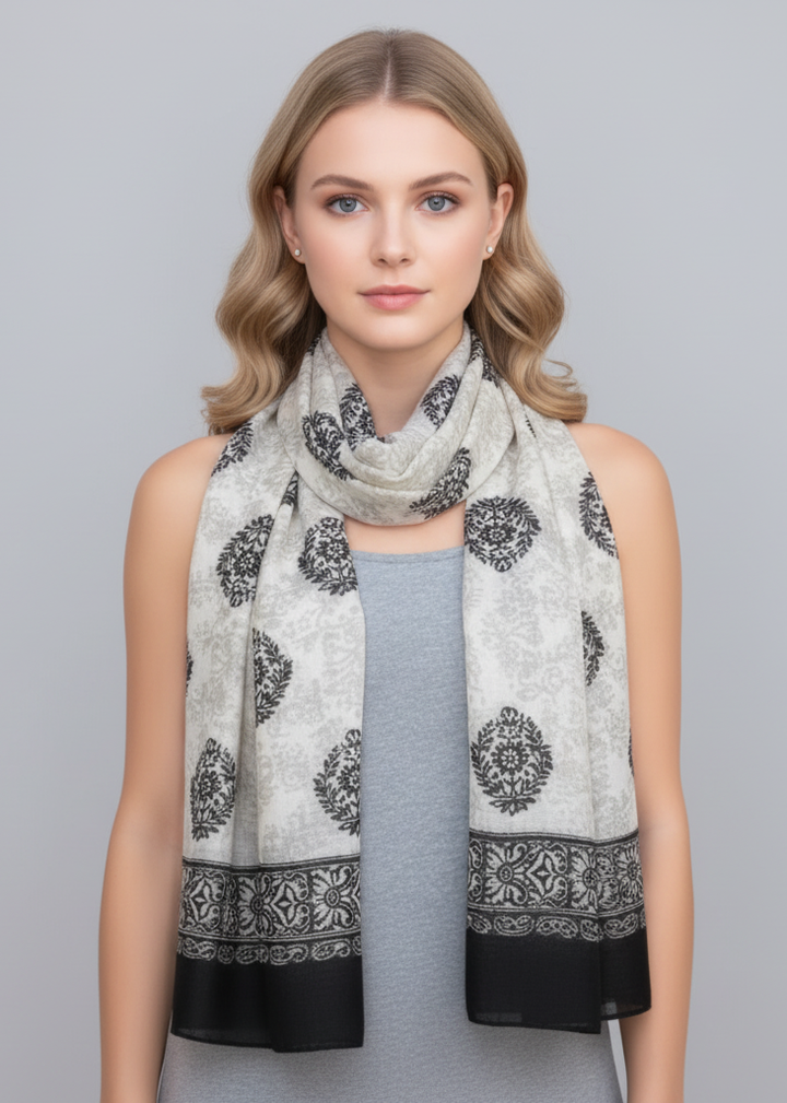 Off-white and black scarf featuring a tribal flower paisley pattern