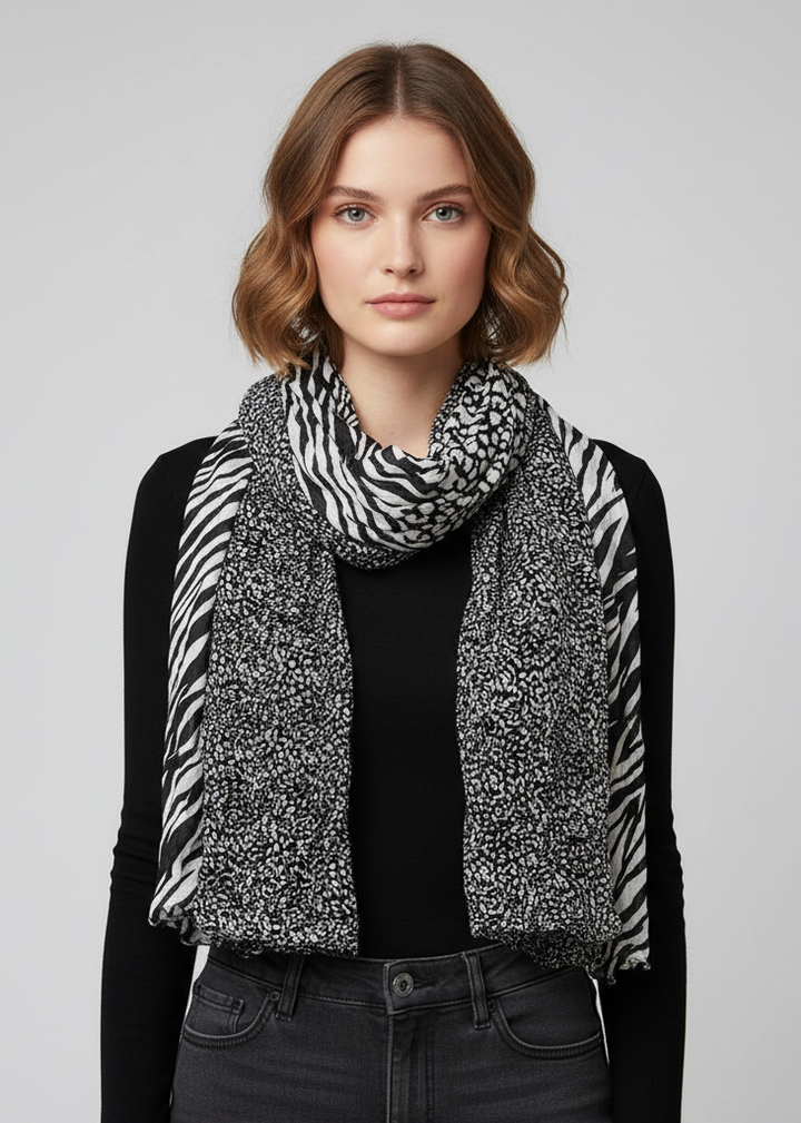 All seasons crinkle scarf featuring a retro zebra and leopard mix animal print in black and white