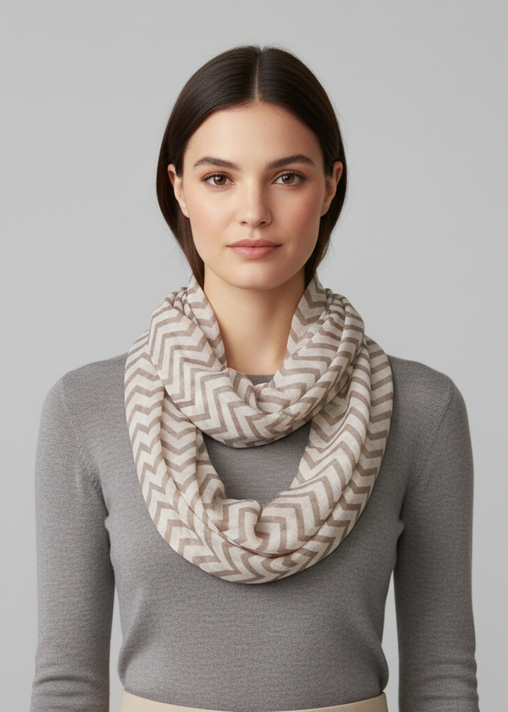 Sheer chevron infinity loop scarf in brown and white lightweight fabric for classic style.