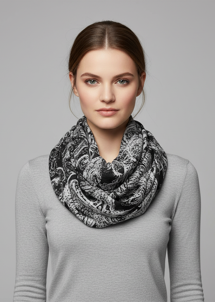 Beautiful graphic sunflower and paisley print infinity loop scarf in black lightweight fabric for women.