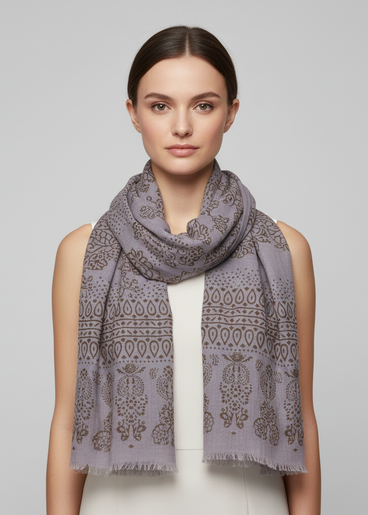 Grey lightweight pashmina scarf with a henna-inspired paisley print and eyelash fringe edges