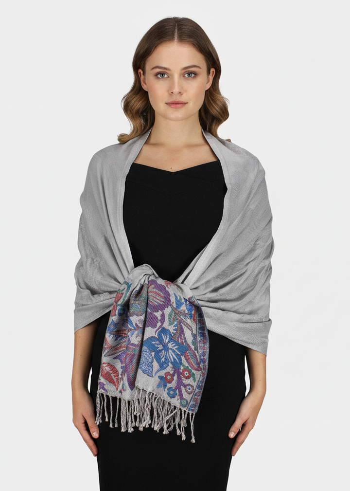 Reversible pashmina wrap shawl featuring a grey paisley and floral border design.