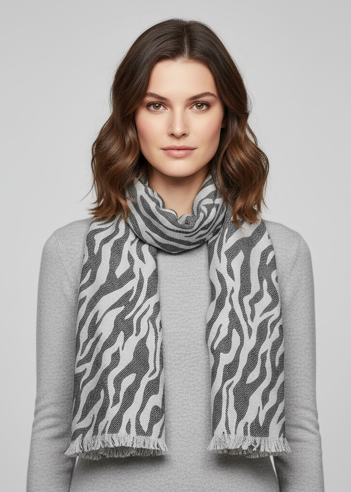 Fashionable zebra animal print pashmina shawl wrap in grey and white with frayed ends