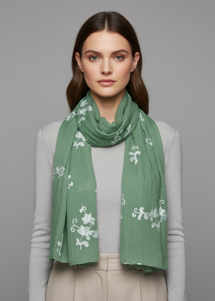 Lightweight mint green summer shawl with intricate floral pansy embroidery and sheer fabric