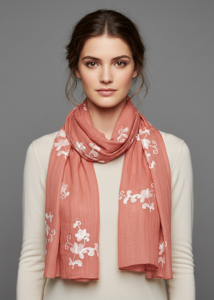 Lightweight summer shawl scarf with intricate floral pansy embroidery and fringed edges in pink