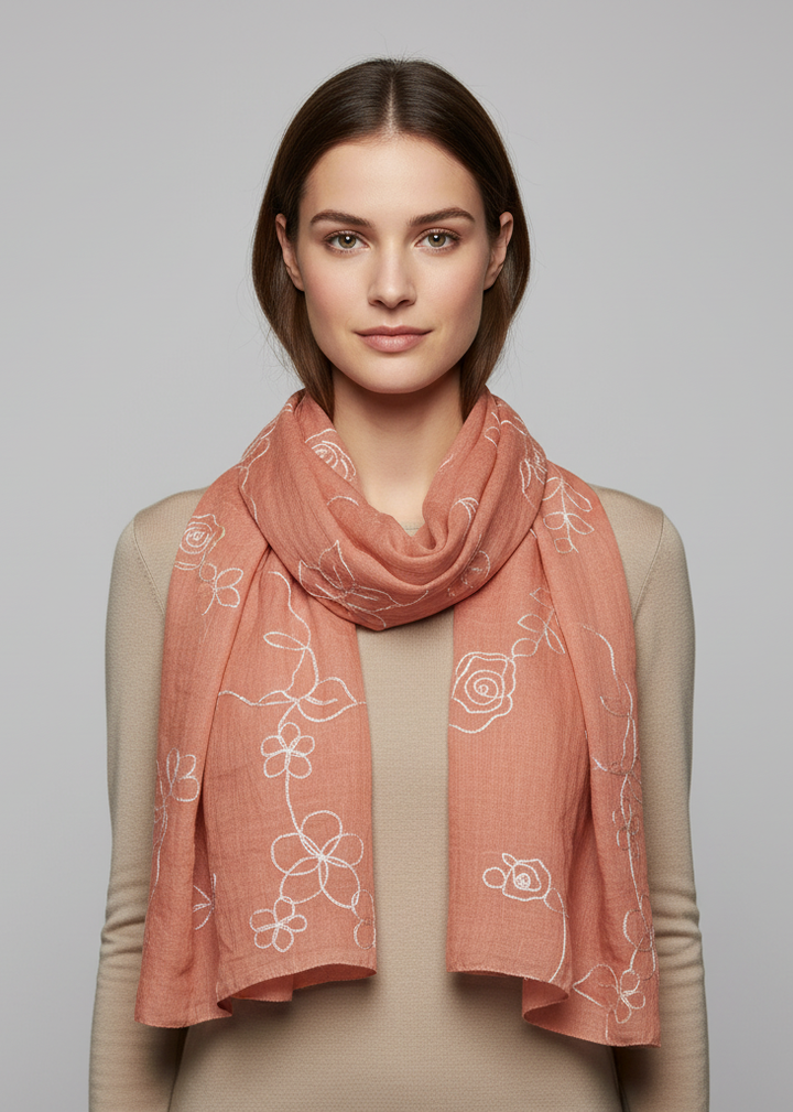 Lightweight pink summer shawl scarf featuring intricate floral rose embroidery and frayed edges
