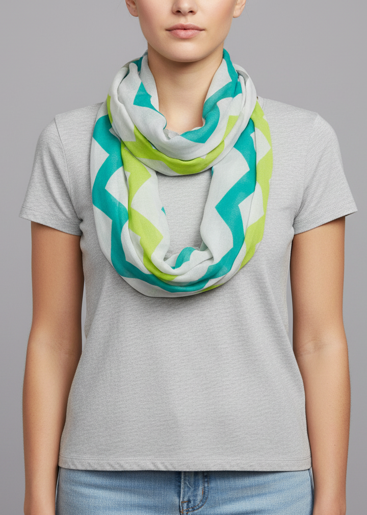 Multicolored chevron geometric infinity loop scarf in aqua and lime green, lightweight breathable polyester accessory for seasonal layering and modern style.