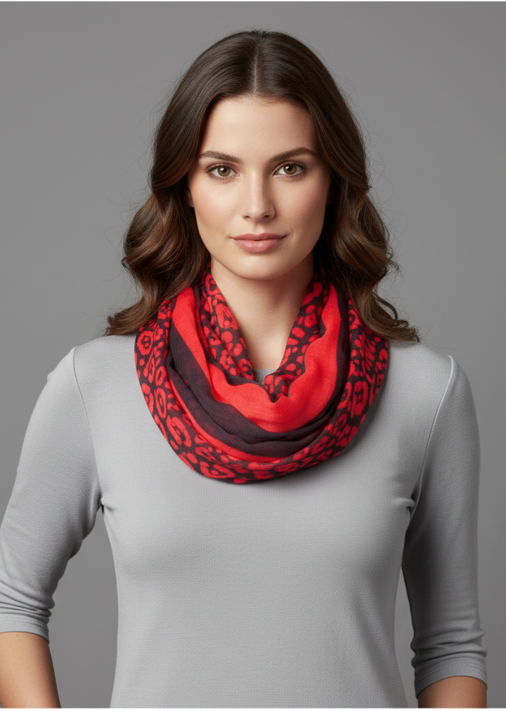 Lightweight hot pink retro neon animal print infinity loop scarf with a soft breathable fabric for year-round styling