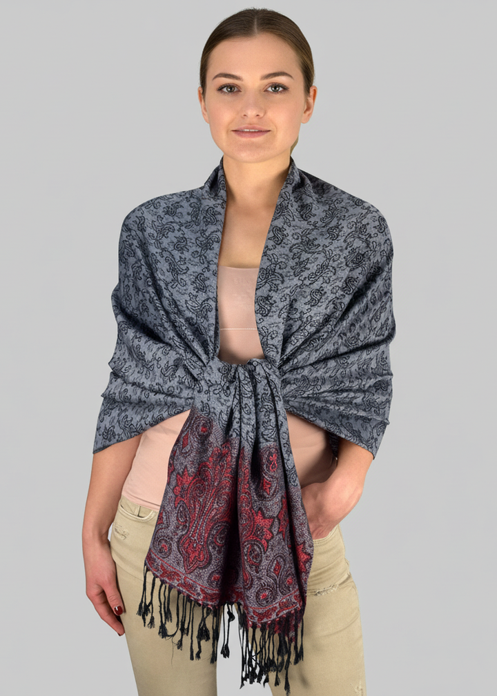 Intricate vine paisley pashmina scarf in grey and red with a classic reversible jacquard pattern and fringed edges.