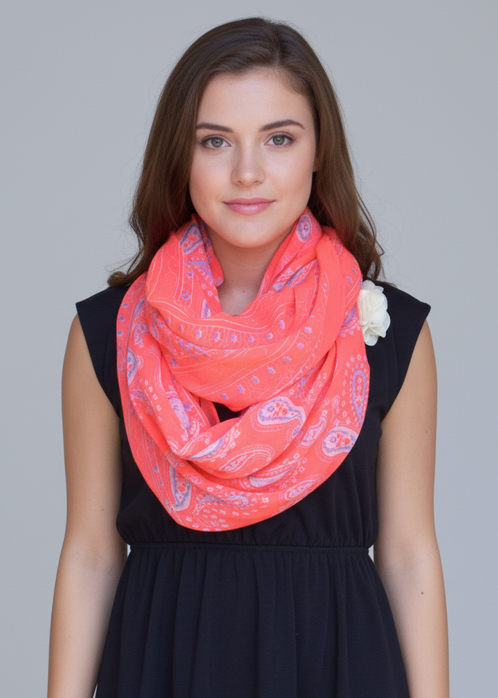 Lightweight paisley design infinity loop scarf in neon pink for women.