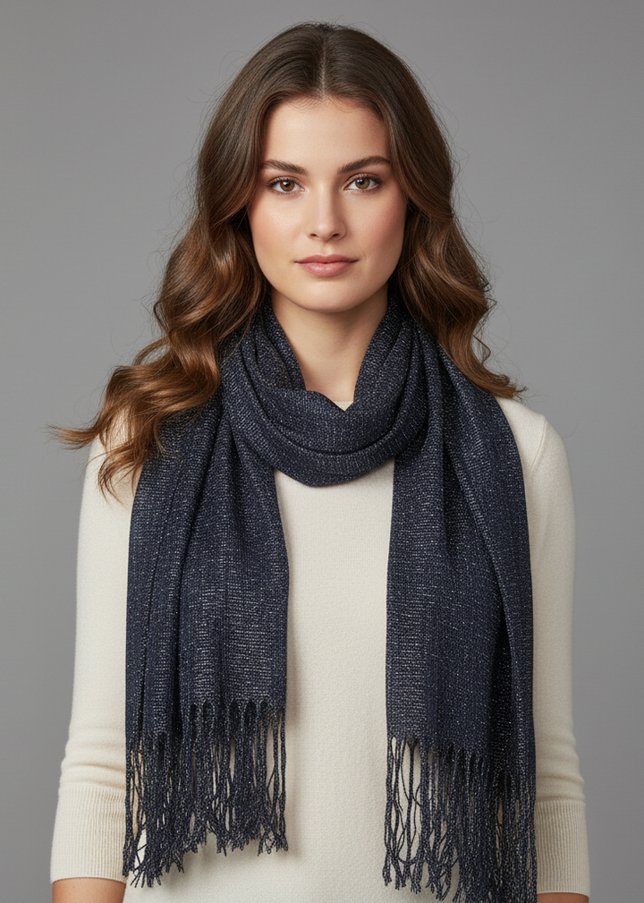 Reversible pashmina shawl featuring an intricate metallic paisley pattern and delicate fringe edges.