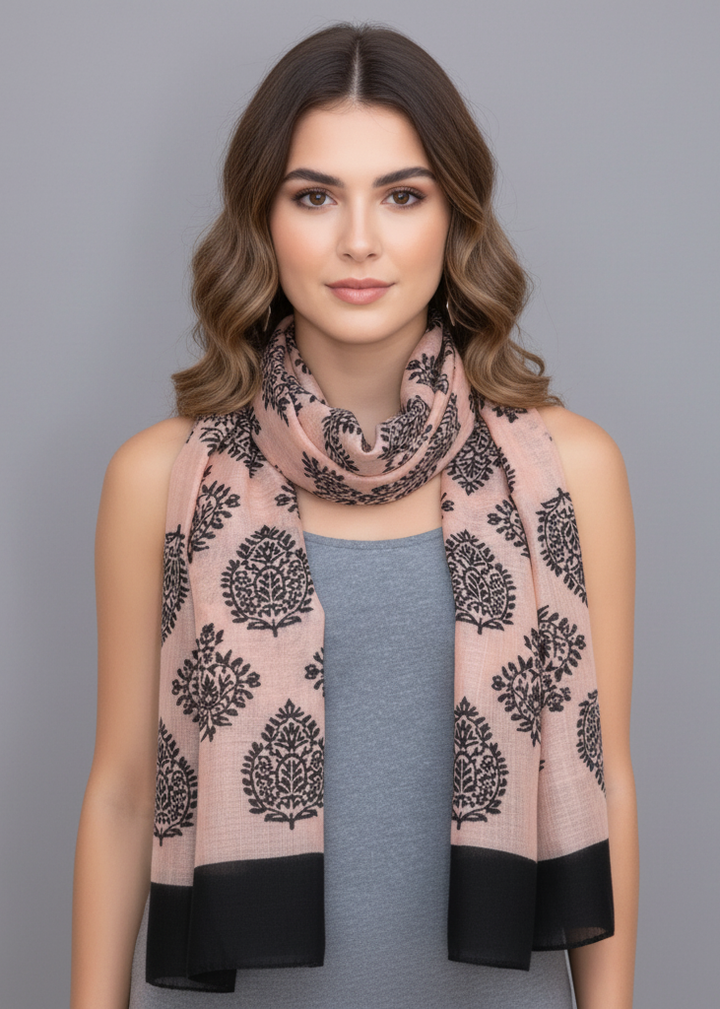 Peach and black scarf with a tribal flower paisley pattern