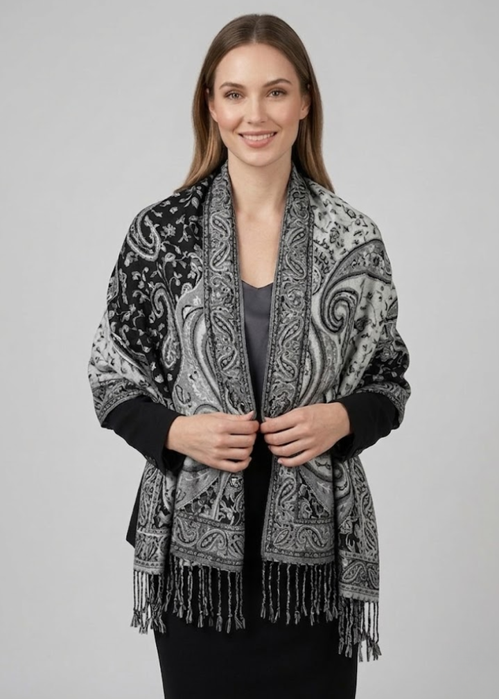 Elegant double layer reversible paisley pashmina shawl wrap scarf in black and white with fringed edges.