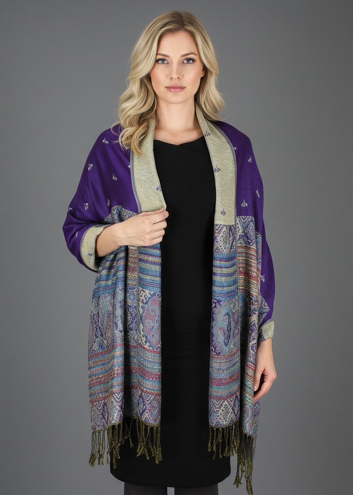 Purple bohemian pashmina shawl featuring an ethnic tribal border design and reversible pattern.