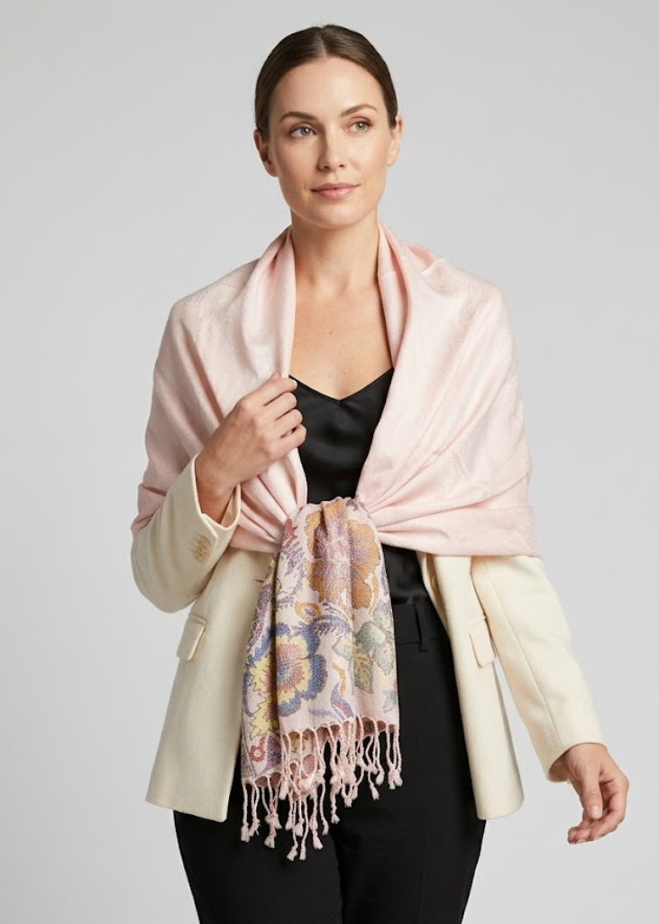 Light pink reversible pashmina wrap shawl featuring an intricate paisley and floral border design.