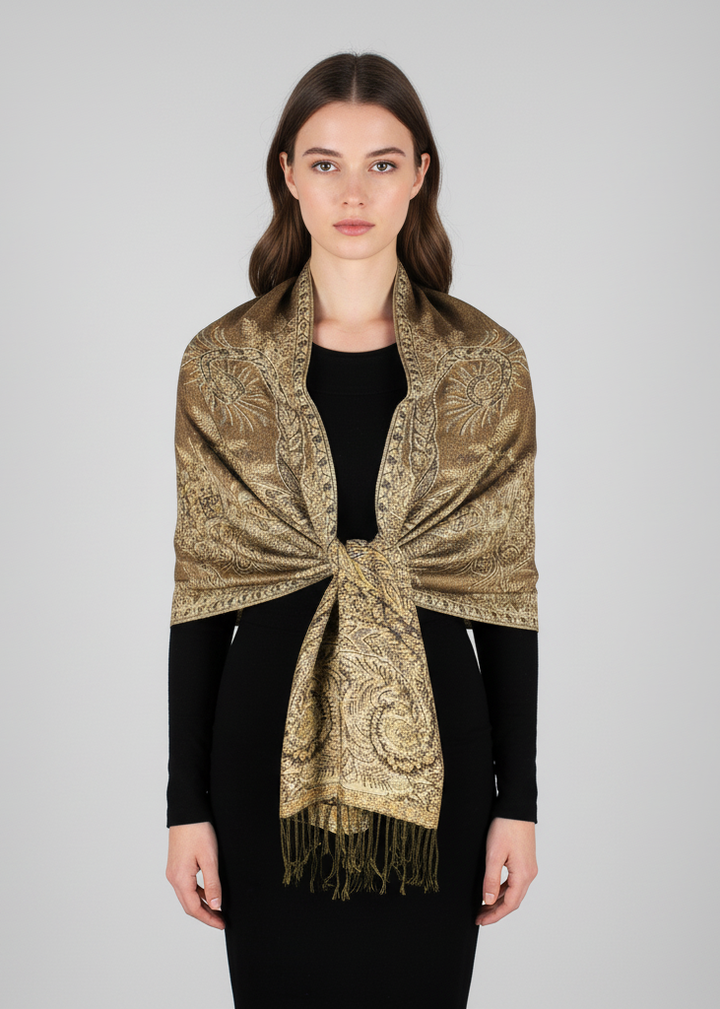 Tan soft vintage pashmina shawl with an intricate paisley print and decorative fringed edges.