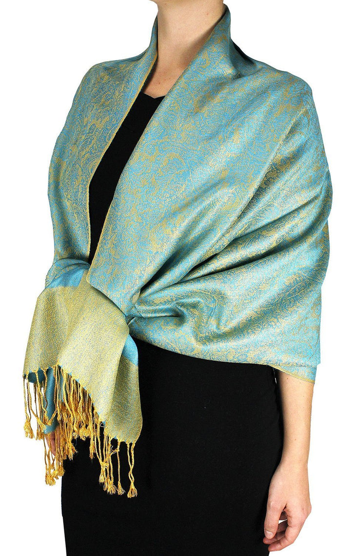 Elegant turquoise and gold vintage jacquard paisley pashmina shawl with fringed edges.