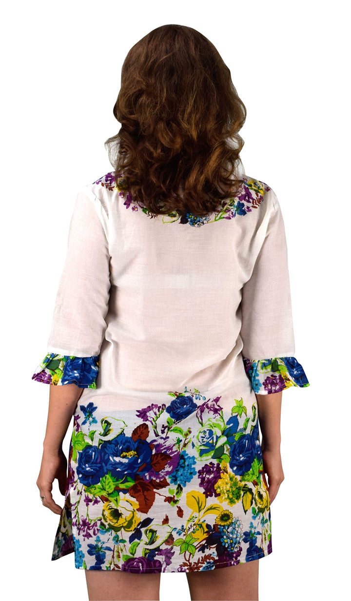 Cotton floral embroidered vintage petite tunic coverup beachwear in a relaxed white design.