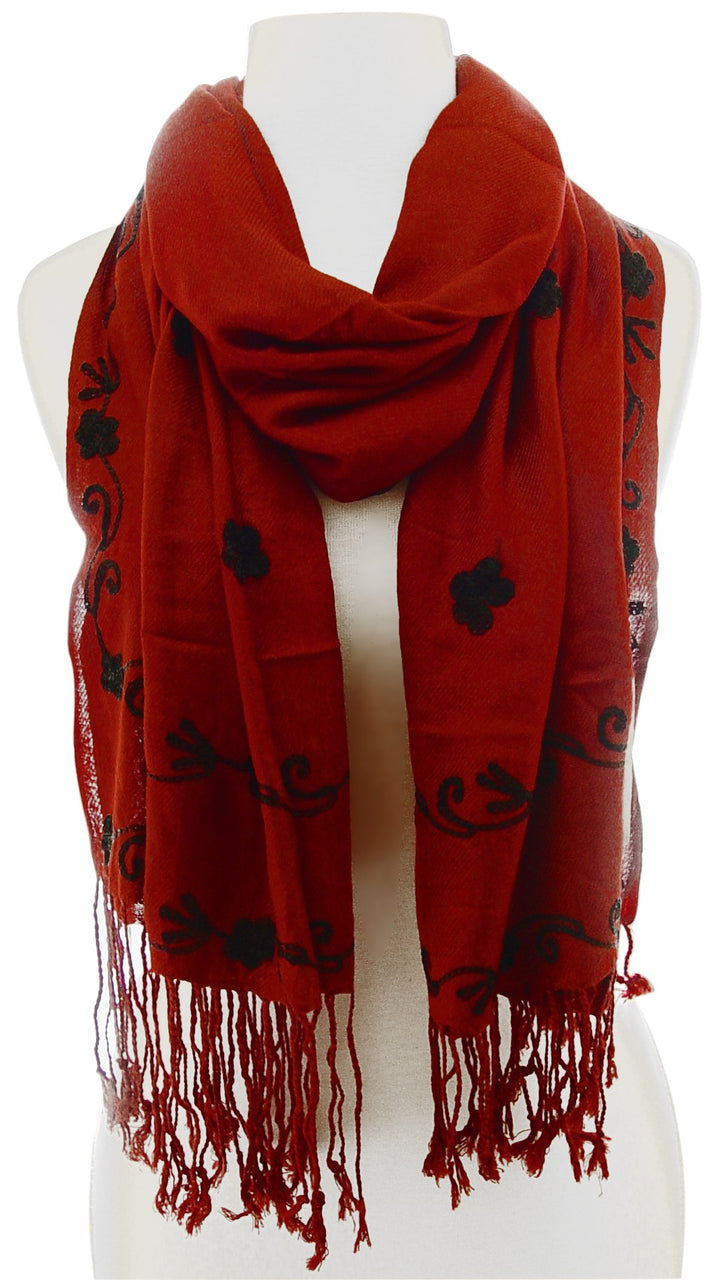 Lightweight summer shawl with delicate floral embroidery and frayed edges perfect for seasonal accessorizing