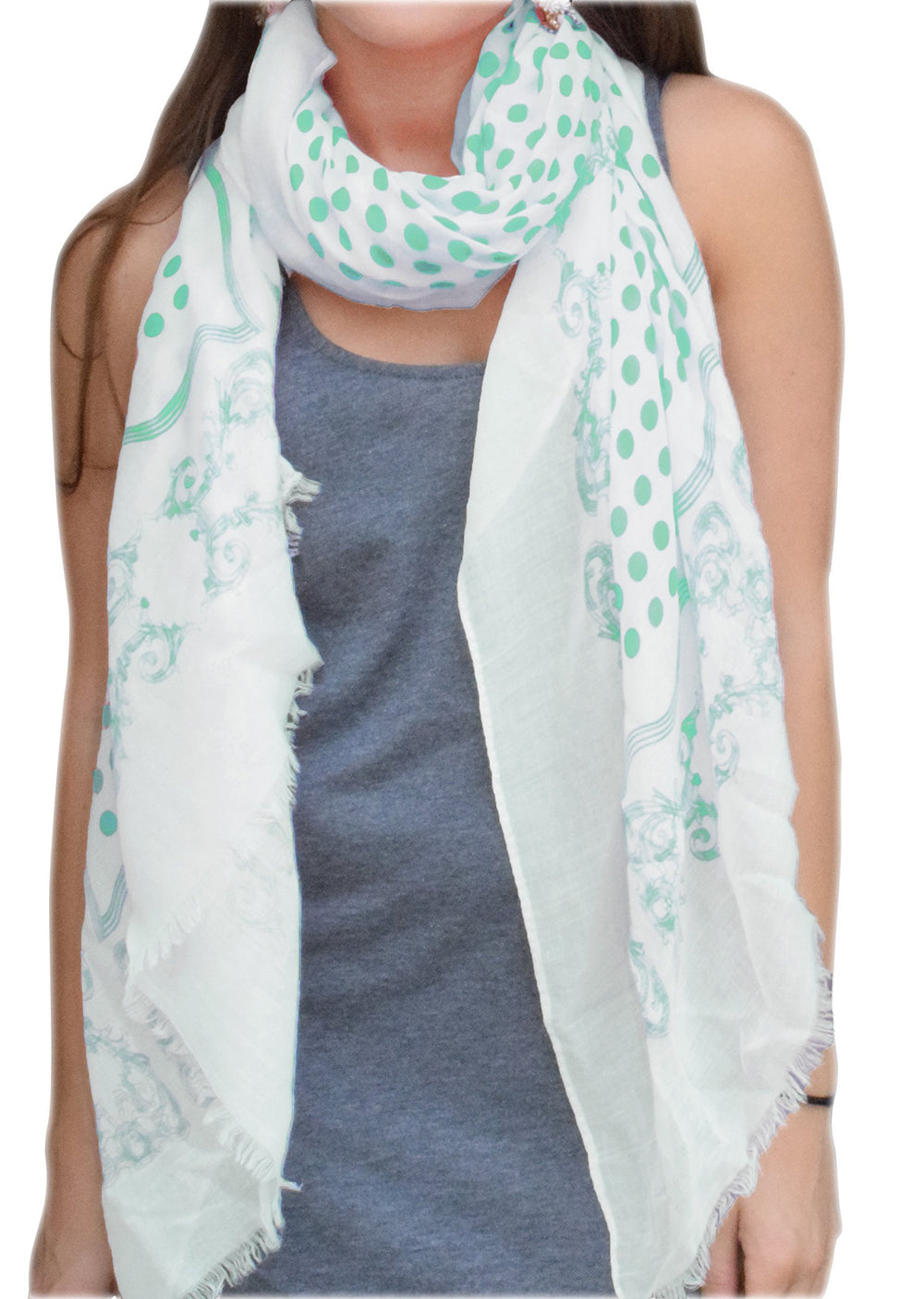 Mint lightweight pashmina scarf with a playful polka dot center, sophisticated paisley border, and delicate eyelash fringe.