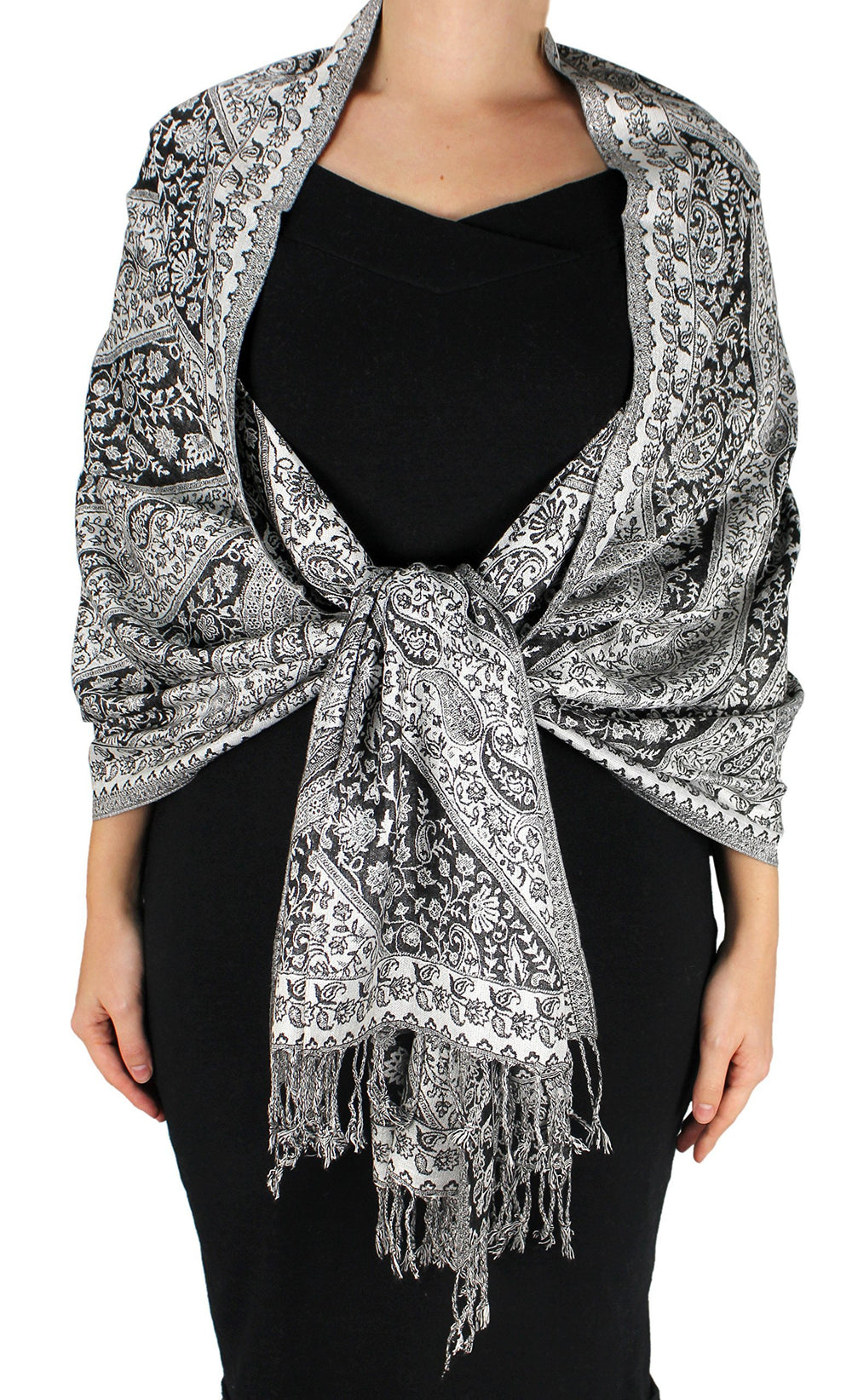 Reversible double-layer pashmina shawl featuring a black and white paisley pattern with fringed edges.